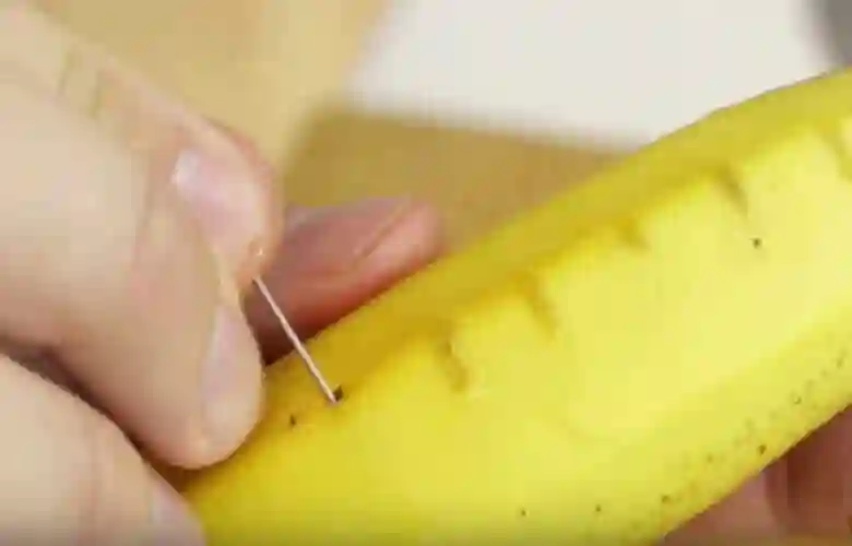 He sticks a needle in a banana and looks what happens next! This trick is super useful!